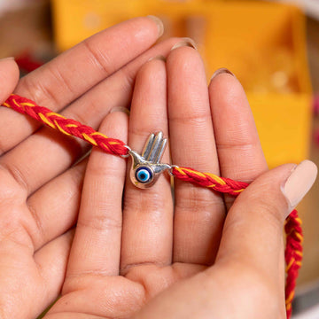 92.5 Silver Hamsa Evil Eye Rakhi with Red Moli Thread – Spiritual Rakhi for Protection & Blessings