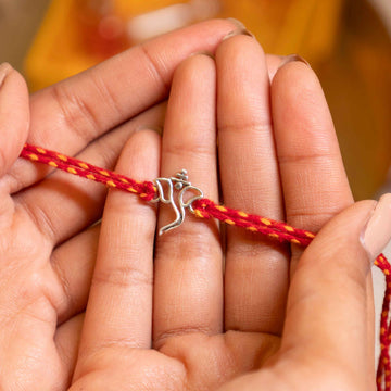 92.5 Silver Netra Evil Eye Rakhi with Red Moli Thread – Protective Designer Rakhi for Brother