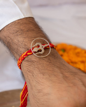 Om Rakhi in 92.5 Silver with Red & Yellow Braided Thread – Aneytri