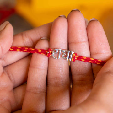 Radha Silver Rakhi in 92.5 Silver on Red Moli Thread – Traditional Name Rakhi for Brother