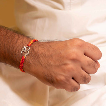 Handcrafted 92.5 Silver Om Rakhi with Red and Yellow Moli Thread