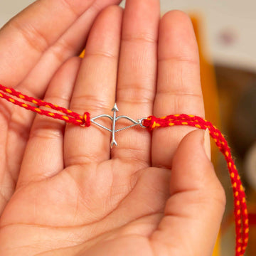 Dhanush Baan Rakhi in 92.5 Silver with Red Thread – Lord Ram Symbol Raksha Bandhan Design