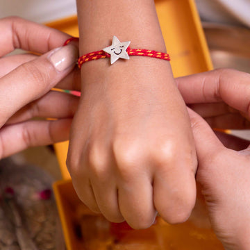 Winking Star Kids Rakhi in 92.5 Silver with Red Yellow Cotton Moli – Raksha Bandhan Special