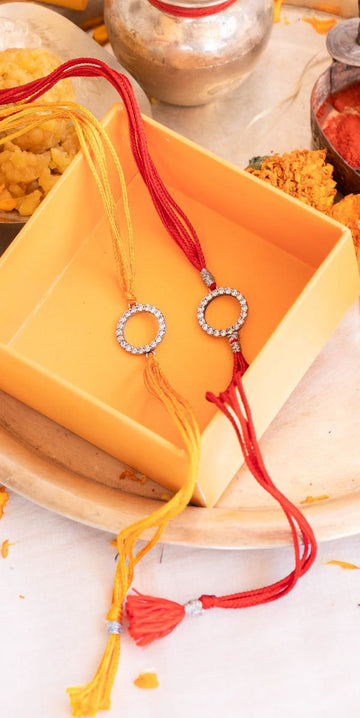Premium Circular CZ Silver Rakhi with Red & Yellow Moli – Aneytri Raksha Bandhan Collection