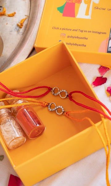 Infinity Symbol Silver Rakhi with CZ Stones & Red-Yellow Moli – Aneytri Raksha Bandhan Collection