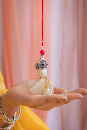 Pearl & Floral Designer Latkan Rakhi with Red Thread – Aneytri Premium Lumba Rakhi Collection