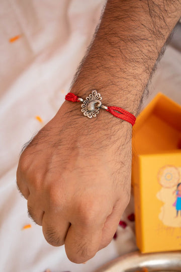 Traditional Floral Rakhi in 92.5 Sterling Silver – Sacred Red Thread Design