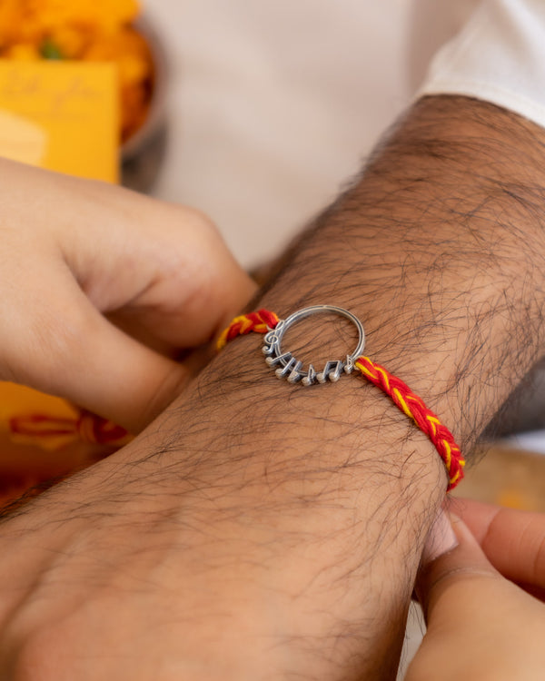 92.5 Sterling Silver Music Note Rakhi with Red-Yellow Moli Thread – Aneytri Designer Rakhi