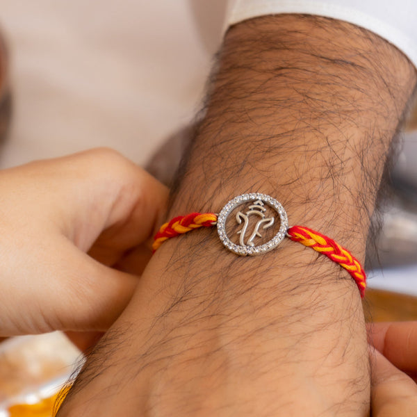 Ganesha Motif 92.5 Silver Rakhi with CZ Frame – Aneytri Spiritual Rakhi Collection