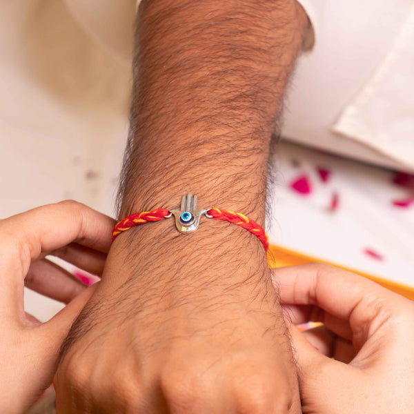 92.5 Silver Hamsa Evil Eye Rakhi with Red Moli Thread – Spiritual Rakhi for Protection & Blessings