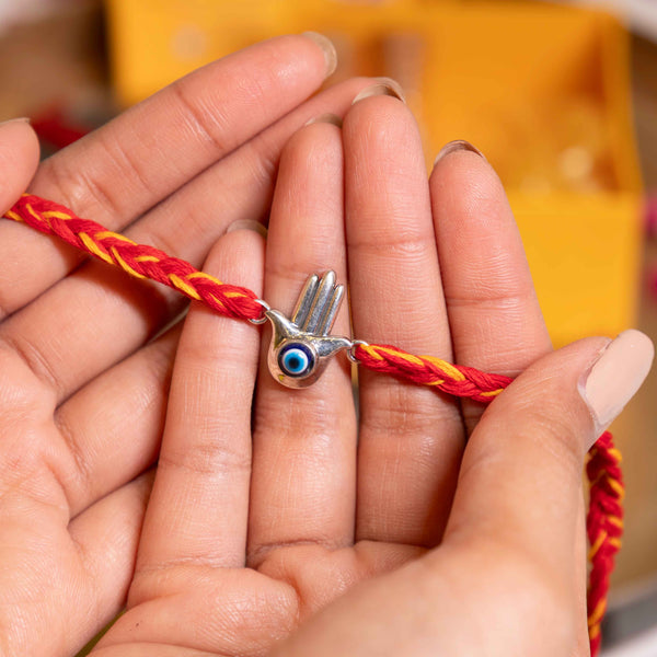 92.5 Silver Hamsa Evil Eye Rakhi with Red Moli Thread – Spiritual Rakhi for Protection & Blessings