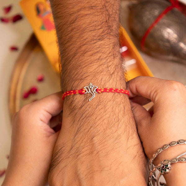 92.5 Silver Netra Evil Eye Rakhi with Red Moli Thread – Protective Designer Rakhi for Brother