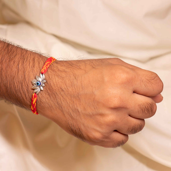 Handcrafted Evil Eye Lotus Rakhi in Silver – Premium Raksha Bandhan Gift by Aneytri