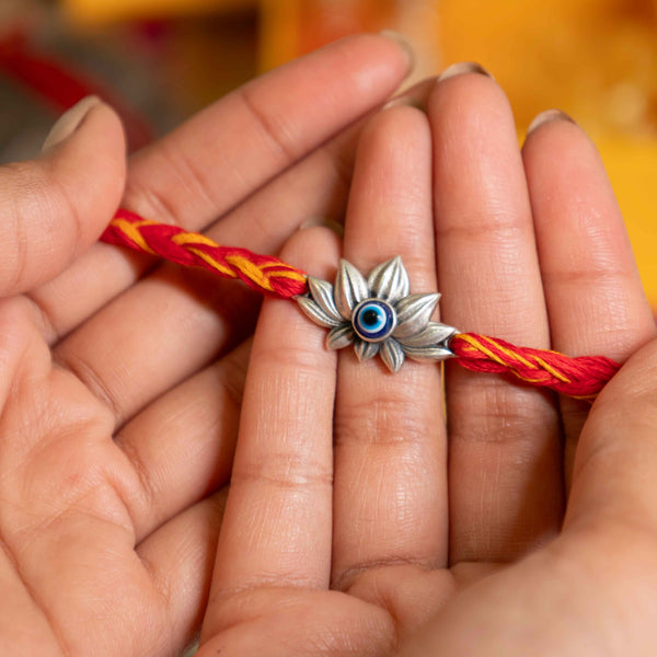Handcrafted Evil Eye Lotus Rakhi in Silver – Premium Raksha Bandhan Gift by Aneytri