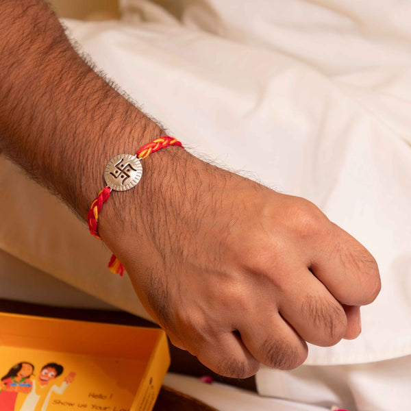 Swastik Rakhi for Brother – Pure 92.5 Silver Rakhi on Red-Yellow Thread by Aneytri
