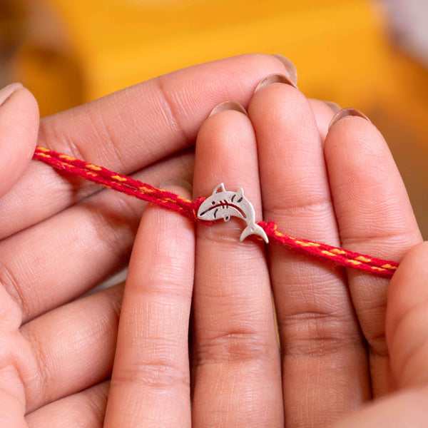 Cute 925 Silver Dolphin Rakhi with Red Moli Thread – Premium Animal Rakhi for Kids