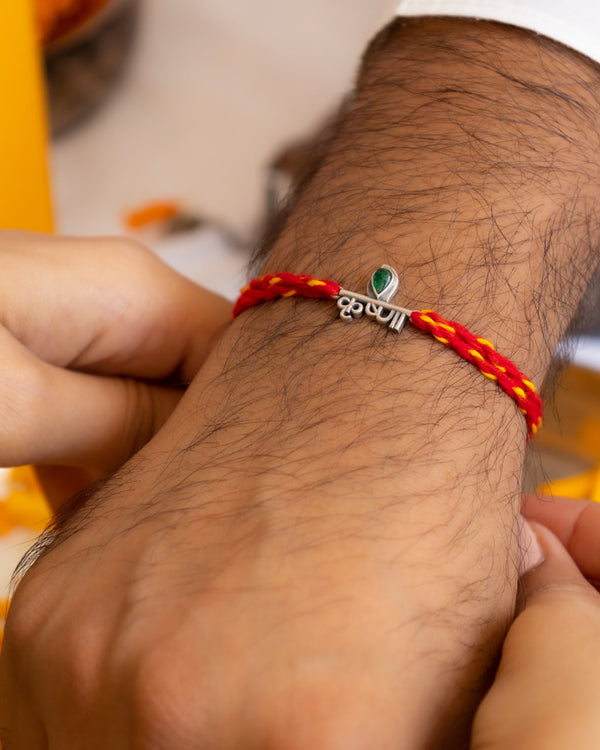 Krishna Name Rakhi in 92.5 Silver with Red-Yellow Cotton Moli – Divine Raksha Bandhan Rakhi