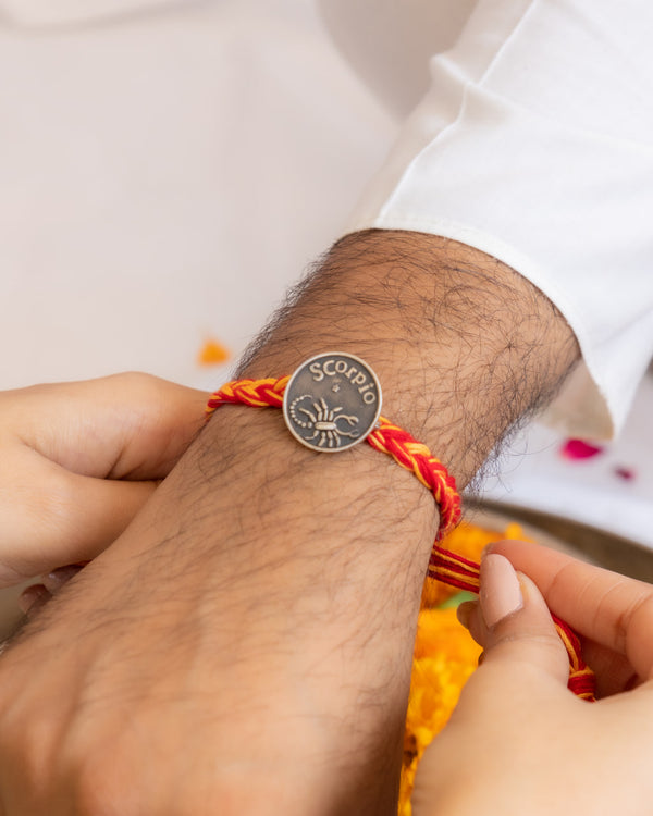 Scorpio Zodiac Rakhi in 92.5 Silver – Bold Raksha Bandhan Thread with Red Moli