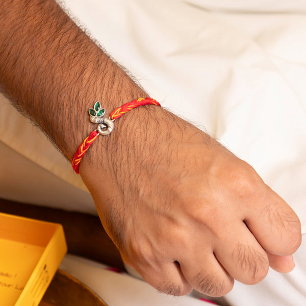 Tulsi Leaf Design Silver Rakhi in 92.5 Silver with Red Moli Thread – Sacred Rakhi for Brother