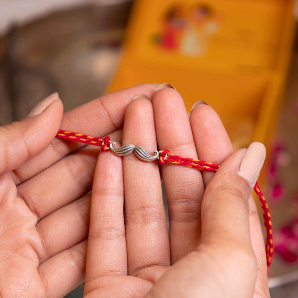 92.5 Silver Mustache Rakhi on Red Braided Thread – Quirky Rakhi for Brother | Aneytri