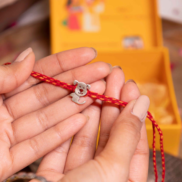 Adorable Puppy Face Kids Rakhi in 92.5 Silver on Red Thread – Child-Friendly Raksha Bandhan Design
