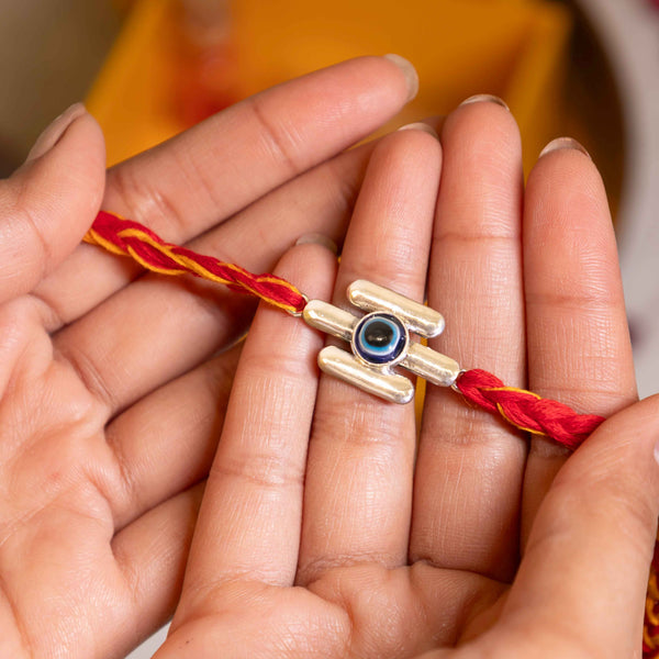 92.5 Silver Evil Eye Rakhi with Blue Center and Red Cotton Thread – Raksha Bandhan Protection Design