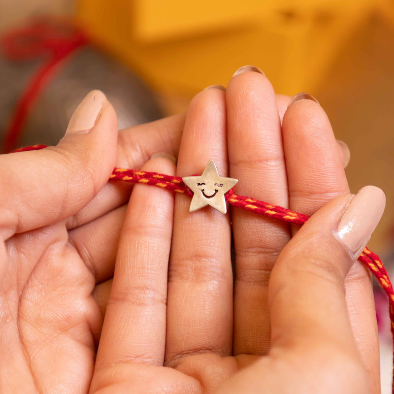 Winking Star Kids Rakhi in 92.5 Silver with Red Yellow Cotton Moli – Raksha Bandhan Special