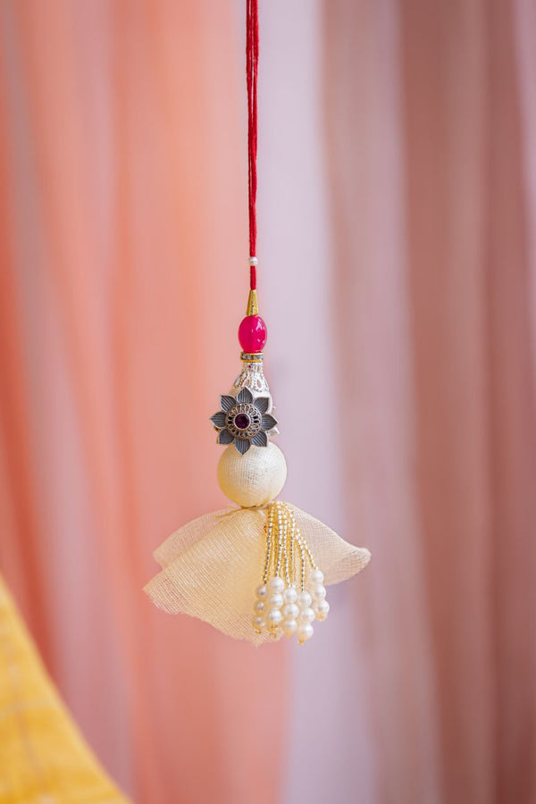 Pearl & Floral Designer Latkan Rakhi with Red Thread – Aneytri Premium Lumba Rakhi Collection