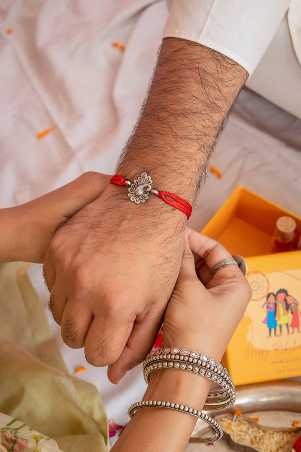 Traditional Floral Rakhi in 92.5 Sterling Silver – Sacred Red Thread Design